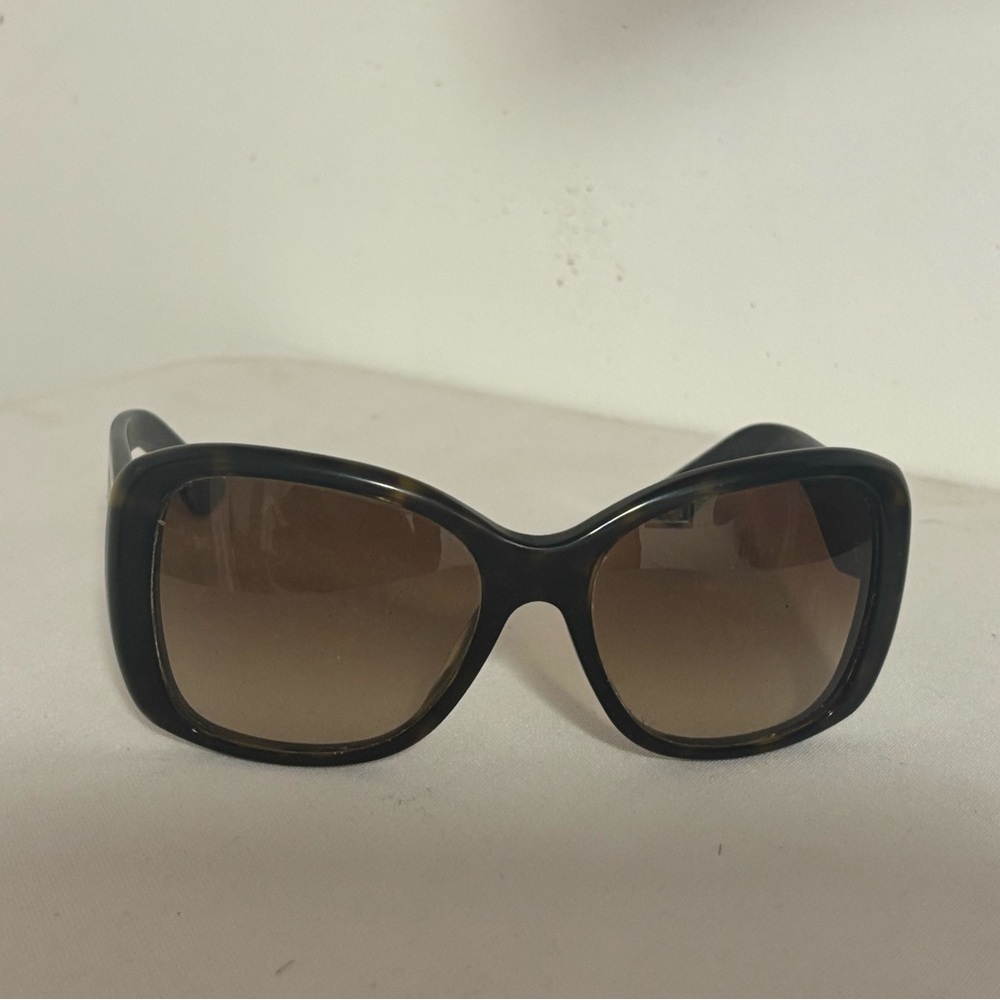Prada Black and Brown Sunglasses available for rent on Pickle